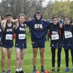 Boys Varsity Cross Country gathers in celebration of a great season and great race. While they may not have qualified for state, their spirits are still high after a great season.